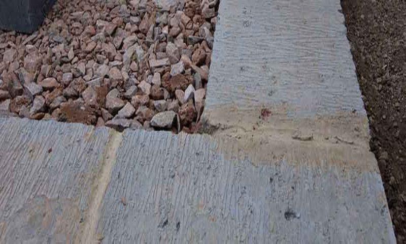 Guys working on a new concrete driveway in bay of plenty