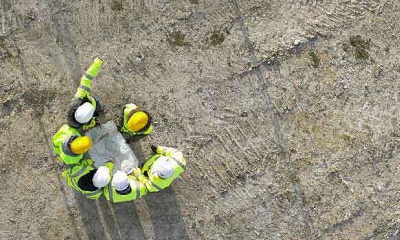 Guys working on a new concrete driveway in bay of plenty